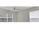 Bedroom featuring a ceiling fan and windows with blinds at 4401 Belcamp Rd, Union City, GA 30213