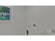 Bright laundry room with utility sink and window at 4401 Belcamp Rd, Union City, GA 30213