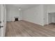A spacious living room with hardwood floors, fireplace and lots of natural light at 4401 Belcamp Rd, Union City, GA 30213