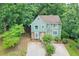Traditional two-story home showcasing well-maintained landscaping and an extended driveway at 5037 Laurel Springs Se Way, Smyrna, GA 30082