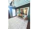Cozy back patio features a patterned outdoor rug and seating, perfect for relaxing at 5037 Laurel Springs Se Way, Smyrna, GA 30082