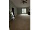 Empty bedroom showcasing vaulted ceiling and a cabinet perfect for storage at 6231 Redan Overlook, Lithonia, GA 30058