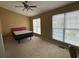 Spacious bedroom featuring large windows for ample natural light and vaulted ceiling at 6231 Redan Overlook, Lithonia, GA 30058