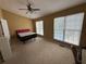 Bright bedroom featuring large windows for ample natural light and vaulted ceiling at 6231 Redan Overlook, Lithonia, GA 30058