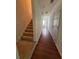Welcoming entryway with hardwood floors leading to the upper level at 6231 Redan Overlook, Lithonia, GA 30058