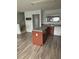 Kitchen with an island and an eat-in area at 6231 Redan Overlook, Lithonia, GA 30058