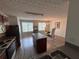 Open kitchen and dining area with modern appliances and island at 6231 Redan Overlook, Lithonia, GA 30058