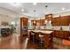 Open kitchen with stainless steel appliances, granite countertops, and adjacent breakfast area at 5830 Caveat Ct, Suwanee, GA 30024