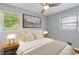 Serene bedroom featuring stylish decor, comfortable bed, and ample natural light for a relaxing retreat at 4653 Ridgewood Dr, Forest Park, GA 30297