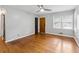 The living room features hardwood floors, a ceiling fan, and natural light at 4653 Ridgewood Dr, Forest Park, GA 30297