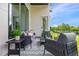 Relaxing back porch with outdoor seating and views of the private landscaped backyard at 292 Highway 279, Fayetteville, GA 30214
