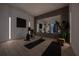 Bright home gym with hardwood floors, fitness equipment, and a large mirror at 292 Highway 279, Fayetteville, GA 30214