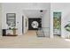 Bright hallway features glass railings and leads to an office area with custom shelving at 292 Highway 279, Fayetteville, GA 30214