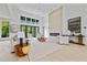 Modern living room with a fireplace, large windows overlooking the backyard and stylish decor at 292 Highway 279, Fayetteville, GA 30214
