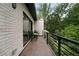 Cozy balcony offering an outdoor seating area with lush greenery at 1380 Wayne Ne Ave, Atlanta, GA 30306