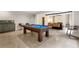 Basement game room featuring a pool table, bar area, and exposed brick accents at 1380 Wayne Ne Ave, Atlanta, GA 30306