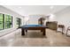 Finished basement featuring a pool table, wet bar, and large window bringing in lots of light at 1380 Wayne Ne Ave, Atlanta, GA 30306