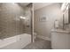 Bathroom with a tub shower featuring gray subway tile, stylish vanity and tile flooring at 1380 Wayne Ne Ave, Atlanta, GA 30306