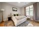 Comfortable bedroom with plush rug, a faux fur throw, and natural light at 1380 Wayne Ne Ave, Atlanta, GA 30306