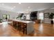 Open floor plan showcasing the kitchen with a large island, adjacent to a stylish living area at 1380 Wayne Ne Ave, Atlanta, GA 30306