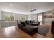 Spacious loft area with hardwood floors, stylish railing, and comfortable seating at 1380 Wayne Ne Ave, Atlanta, GA 30306