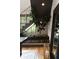 Unique staircase design with accent lighting and live tree at 1380 Wayne Ne Ave, Atlanta, GA 30306
