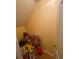 An attic with storage of christmas ornaments and items on a wooden floor at 2517 Oak Valley Ln, Dacula, GA 30019