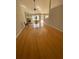 Bright living room features fireplace, hardwood floors, and access to deck at 2517 Oak Valley Ln, Dacula, GA 30019
