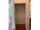 Spacious closet with hardwood floors, rack, and natural light from the window outside at 5669 Avonley Creek Dr, Sugar Hill, GA 30518