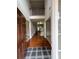 Welcoming foyer view with wood floors, staircase, and second-floor view at 5669 Avonley Creek Dr, Sugar Hill, GA 30518