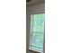 The window lets a lot of natural light into the room at 5669 Avonley Creek Dr, Sugar Hill, GA 30518