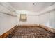 Unfinished basement with damaged walls and floor at 2875 Monterey Dr, Decatur, GA 30032