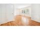 Bedroom featuring hardwood floors, trim, and a view of the outside at 2875 Monterey Dr, Decatur, GA 30032