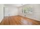 Bedroom with hardwood floors and natural light from multiple windows at 2875 Monterey Dr, Decatur, GA 30032