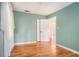 Bedroom featuring hardwood floors, green walls and ceiling fan at 2875 Monterey Dr, Decatur, GA 30032