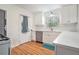 Bright kitchen with stainless steel dishwasher and white cabinets at 2875 Monterey Dr, Decatur, GA 30032