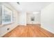 Bright living room with hardwood floors and large windows at 2875 Monterey Dr, Decatur, GA 30032