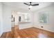 Bright living room with ceiling fan view into the kitchen at 2875 Monterey Dr, Decatur, GA 30032