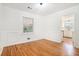 Bright living room featuring wood floors and a view into the kitchen at 2875 Monterey Dr, Decatur, GA 30032