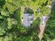 A high-angle aerial perspective of a home displaying its roof and the surrounding landscape at 2958 Paul Harris Rd, Dallas, GA 30157