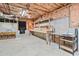 Unfinished basement with workbench and storage area at 2958 Paul Harris Rd, Dallas, GA 30157