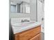 Bathroom features a white sink with a wooden vanity and a large mirror at 2958 Paul Harris Rd, Dallas, GA 30157