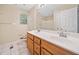 Bathroom with a double vanity, tile flooring, and ample counter space at 2958 Paul Harris Rd, Dallas, GA 30157