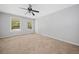 A spacious bedroom bathed in natural light, featuring plush carpeting and neutral decor at 2958 Paul Harris Rd, Dallas, GA 30157
