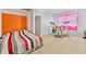 Bedroom with colorful wall, carpeted floor, and drum set at 2958 Paul Harris Rd, Dallas, GA 30157