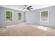 Bright bedroom with large windows offering natural light and a view of the outdoors at 2958 Paul Harris Rd, Dallas, GA 30157