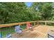 Wooden deck with outdoor seating, perfect for relaxing and enjoying the backyard view at 2958 Paul Harris Rd, Dallas, GA 30157