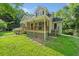 Charming two-story home with a cozy front porch and lush landscaping at 2958 Paul Harris Rd, Dallas, GA 30157