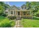 Charming home featuring a front porch, well-maintained lawn, and inviting curb appeal at 2958 Paul Harris Rd, Dallas, GA 30157