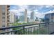 Excellent city view from a private balcony with trees in the foreground at 3338 Peachtree Ne Rd # 1506, Atlanta, GA 30326